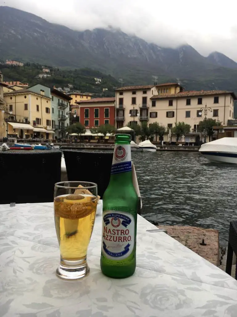 Bottle of Peroni overlooking Malcesine Harbour