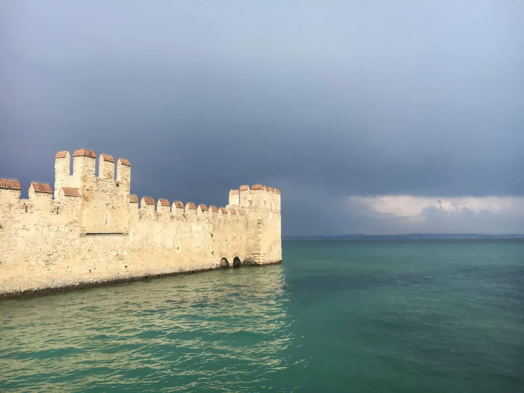 Sirmione Castle walls stretching out onto Lake Garda